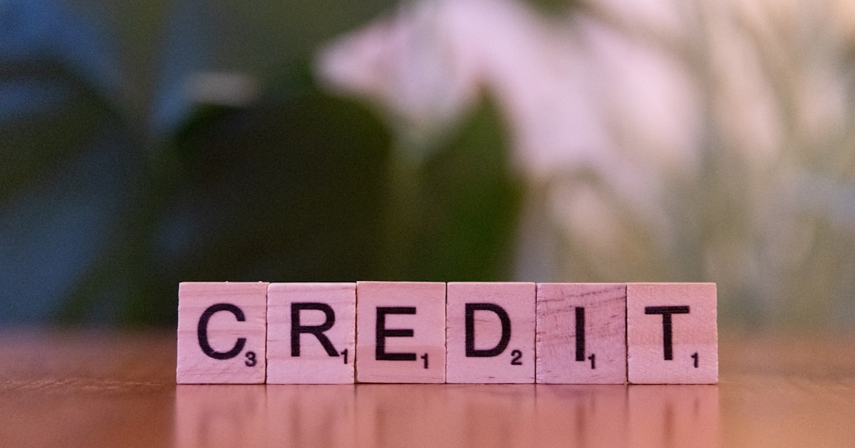 How To Improve Your Credit Score: The Complete 2026 Guide Credit Score Wooden Block Letters
